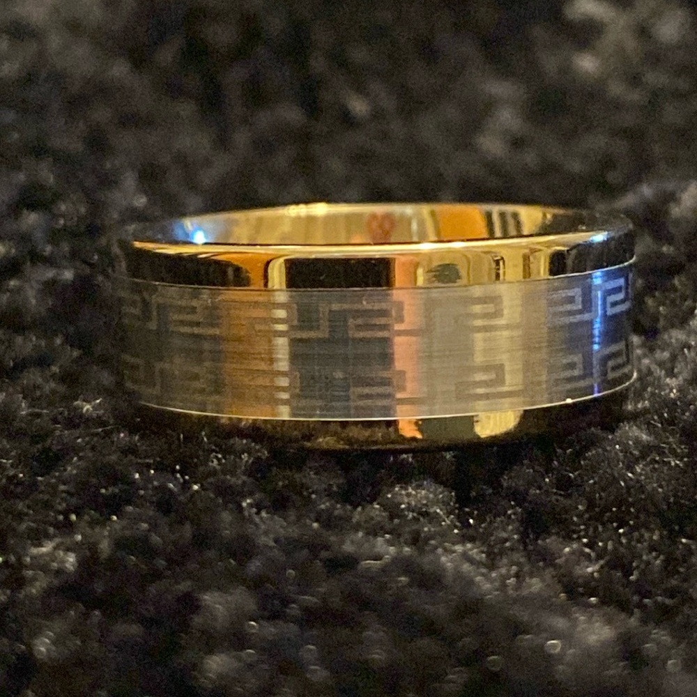 Stainless steel ring. Gold and silver tone. Size 8